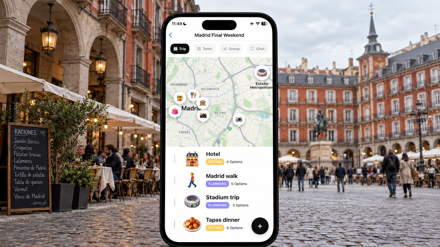 FlowTrip Madrid final weekend plan on a phone in a Plaza Mayor street scene