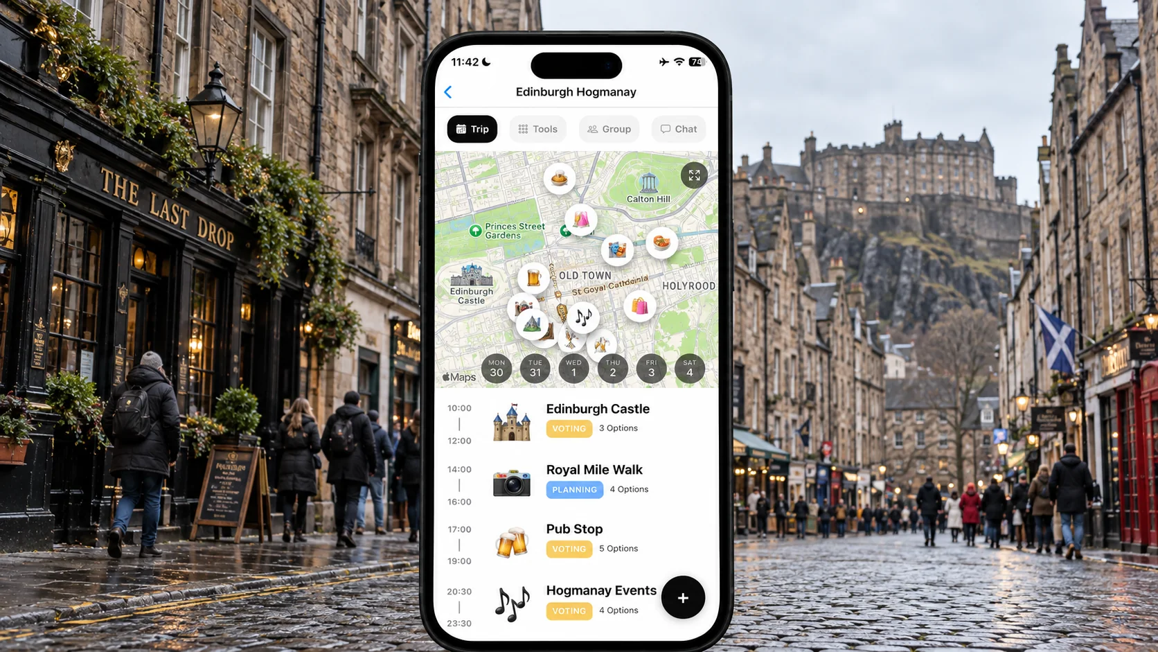 Illustrated FlowTrip Hogmanay group plan on an upright phone in Edinburgh Old Town with Edinburgh Castle behind it